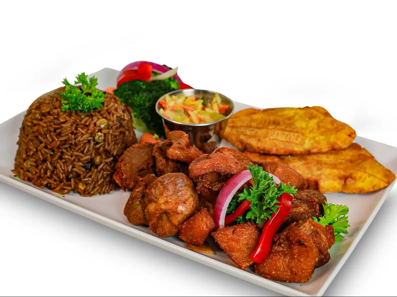 Griot with diri djon djon, tostones and pikliz